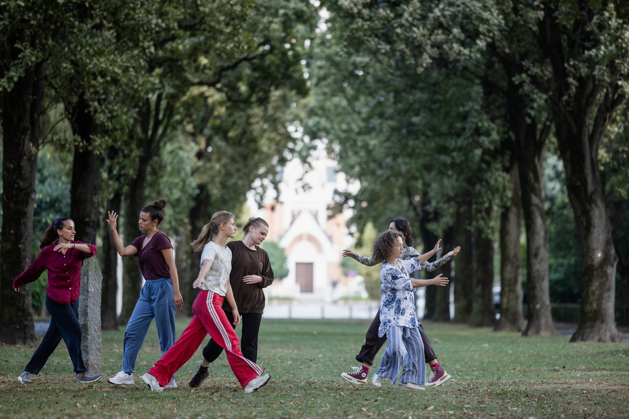 Dancers on a green garden